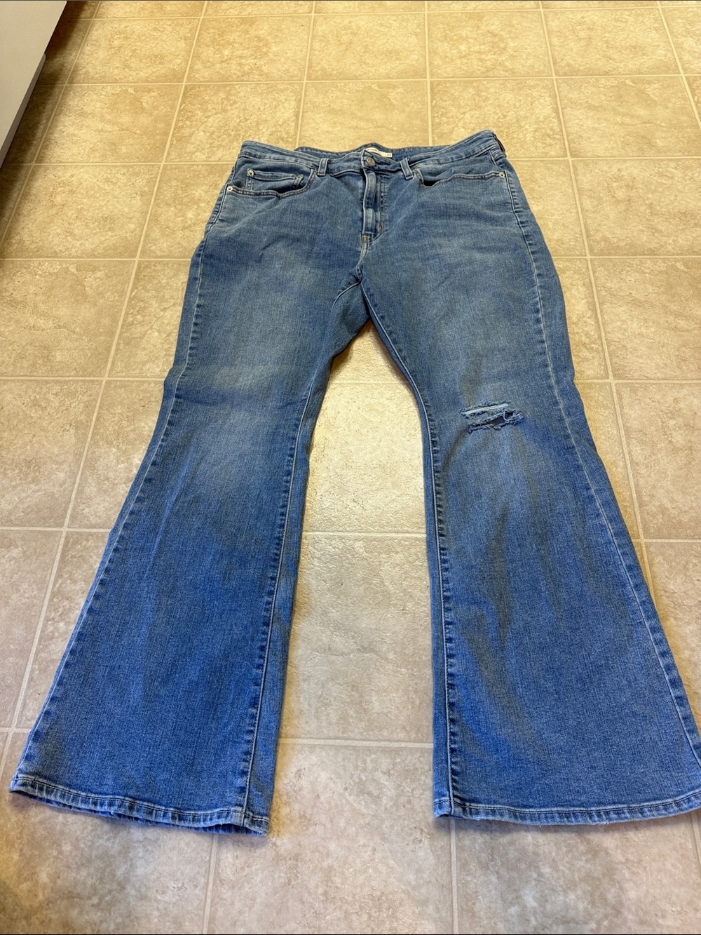 Levi's Blue Flare Jeans with Knee Distress